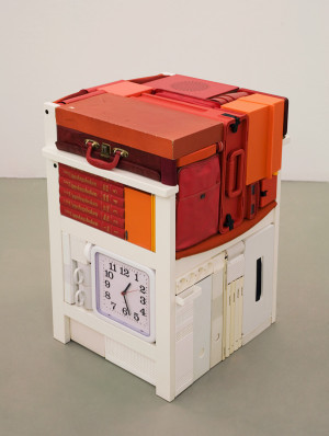 Frozen Belongings - Armchair, typewriter, books, boxes, clock, etc. Dimensions: 0.55 x 0.8 x 0,55 m